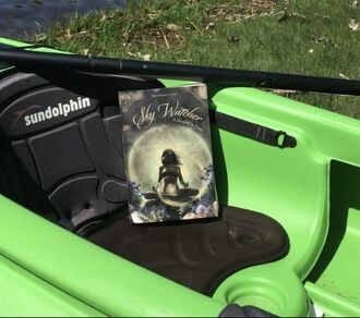 Book 1, A Shadow in Time in green kayak.