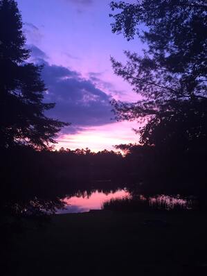 Photo of purple sunset at cottage.