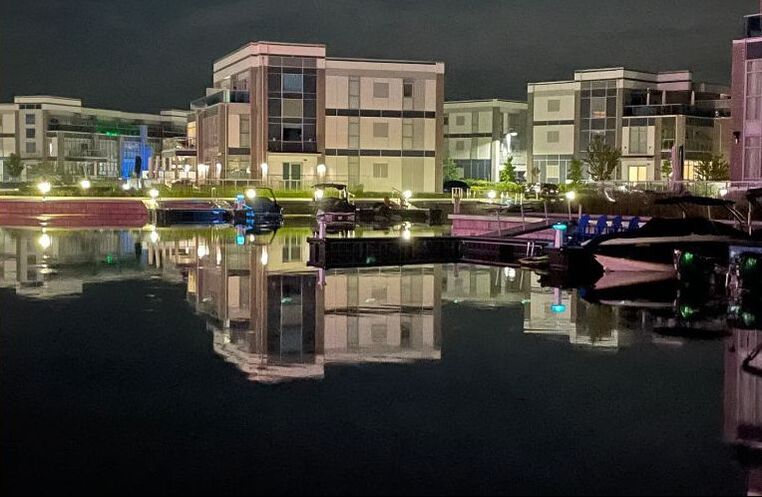 friday harbour at night, lights of buildings reflecting on the water